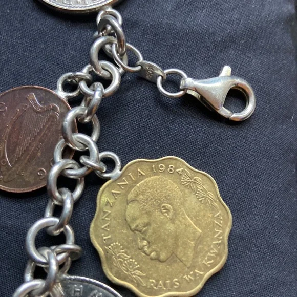 925 sterling silver coin charm bracelet 11 of them on here milor bracelet
